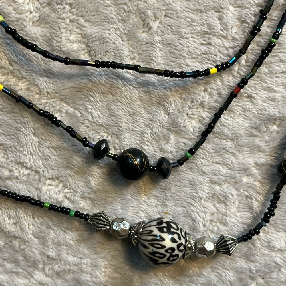 Layered Black and Silver Necklace with Decorative Beads